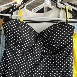 Black polka dot strapless dress with breast padding. Stretchy